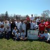 10-Group shot at sign
